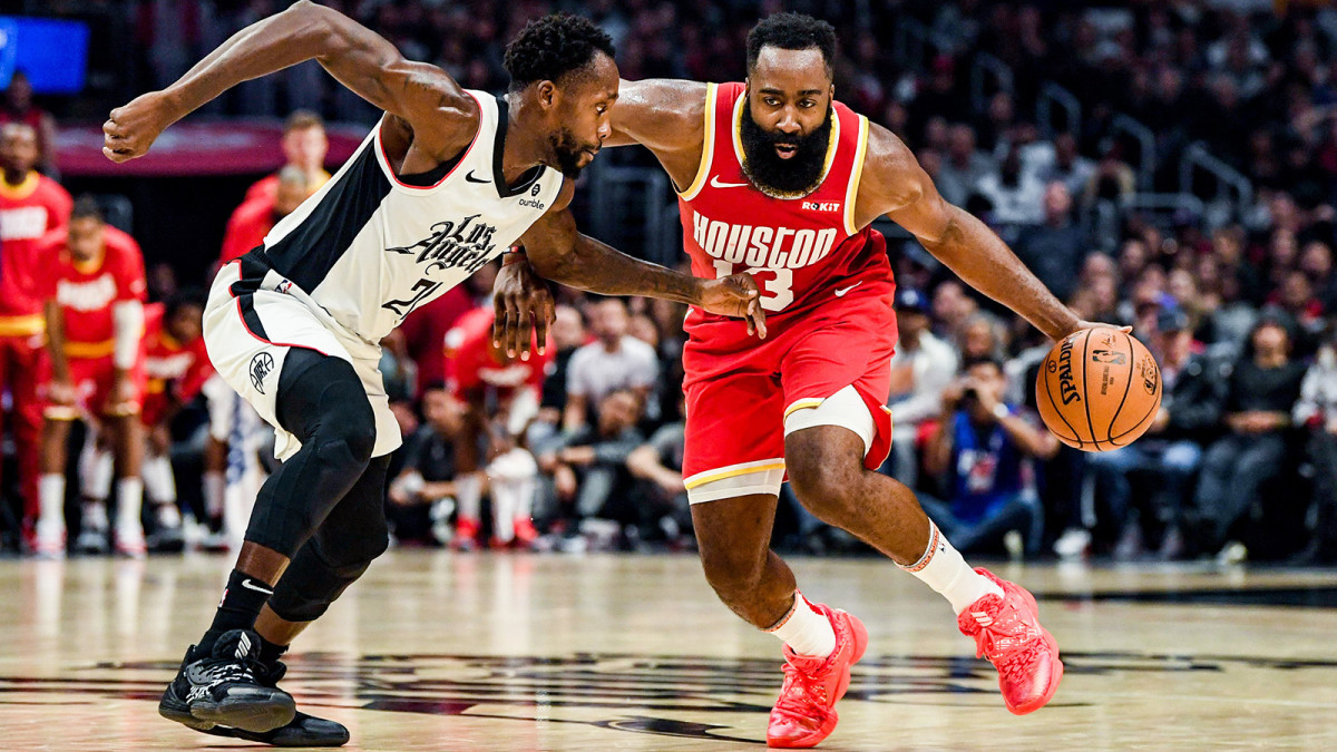 James Harden drives to the hoop against Patrick Beverley